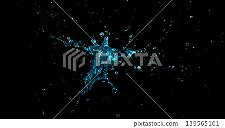 Dynamic water splash explosion isolated on black background with realistic liquid droplets for VFX overlay and cinematic visual effects Dynamic water splash explosion isolated on black background with realistic liquid droplets for VFX overlay and cinematic visual effects 139565101