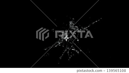 Dynamic water splash explosion isolated on black background with realistic liquid droplets for VFX overlay and cinematic visual effects 139565108
