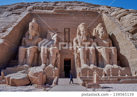 Abu Simbel, Aswan, Egypt- February 10 2025: Abu Simbel Temples in Abu Simbel Aswan, Egypt exterior daylight shot showing The Great Temple of Ramesses II with tourist at the main entrance Abu Simbel, Aswan, Egypt- February 10 2025: Abu Simbel Temples in Abu Simbel Aswan, Egypt exterior daylight shot showing The Great Temple of Ramesses II with tourist at the main entrance 139565139