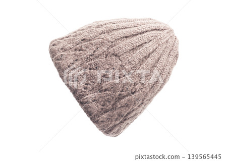 Knitted brown winter hat isolated on white background. Knitted brown winter hat isolated on white background. 139565445