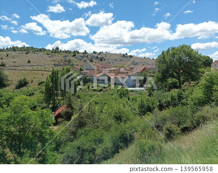 Panoramic view of Fuembellida village nestled in the mountains of Guadalajara, Spain. Panoramic view of Fuembellida village nestled in the mountains of Guadalajara, Spain. 139565958