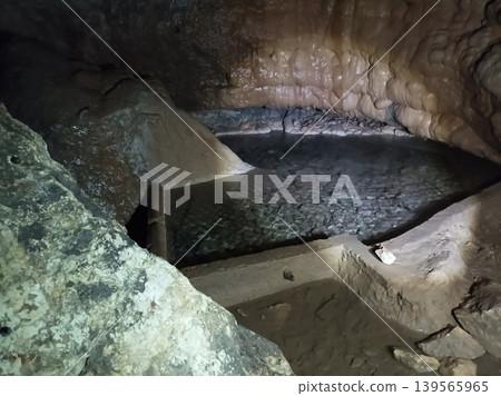 Subterranean lake inside the Sima de Alcoron cave, Alto Tajo, Spain. Subterranean lake inside the Sima de Alcoron cave, Alto Tajo, Spain. 139565965