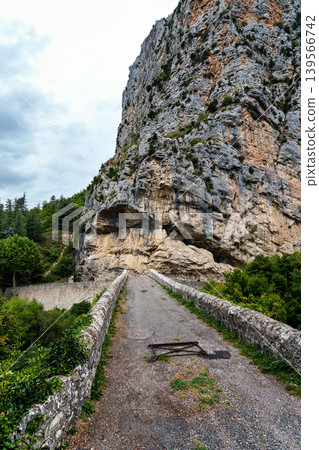 Pont du Roc, Rock Bridge, an old stoned bridge crossing the river Verdon in Castellane, Provence, France Pont du Roc, Rock Bridge, an old stoned bridge crossing the river Verdon in Castellane, Provence, France 139566742