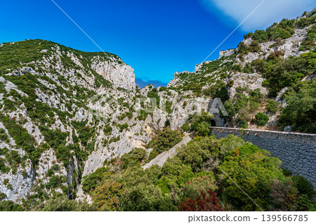 Driving through the amazing Gorges de Galamus, Aude, Eastern Pyrenees, Languedoc Roussillon, France. 139566785