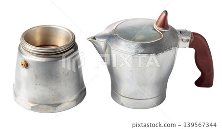 A classic Italian aluminium moka pot isolated on a white background. A classic Italian aluminium moka pot isolated on a white background. 139567344