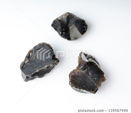 Natural black flint, chert mineral isolated Natural black flint, chert mineral isolated 139567499