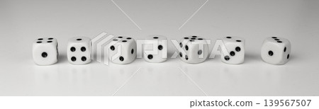 White game dice with black dots 139567507