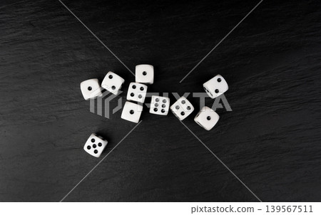 White game dice with black dots White game dice with black dots 139567511