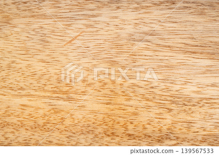Mango wood texture top view. Kitchen wooden tray background, organic Mangifera indica veneer Mango wood texture top view. Kitchen wooden tray background, organic Mangifera indica veneer 139567533