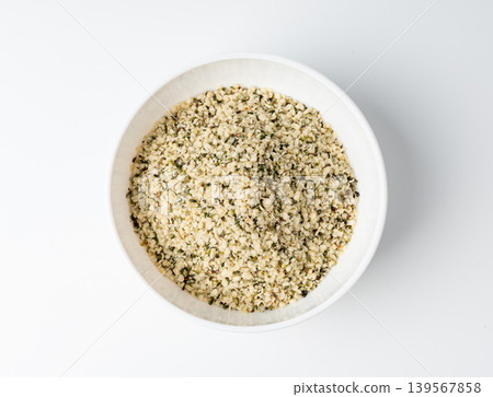 Shelled hemp seeds pile isolated, peeled cannabis grains, marijuana kernels without peel 139567858