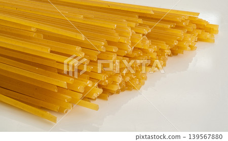 Dry spaghetti macro pattern, raw spagetti detailed texture Dry spaghetti macro pattern, raw spagetti detailed texture 139567880