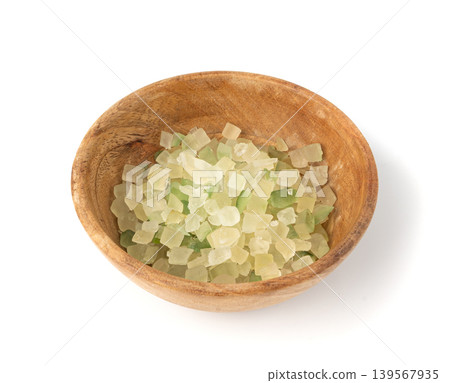 Candied citrus peel isolated. Diced succade from the citron or citrus medica 139567935