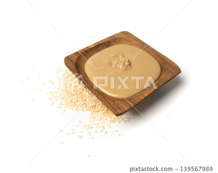 Tahini, sesame seeds paste, tahina sauce, eastern dip, traditional oriental ground sesame Tahini, sesame seeds paste, tahina sauce, eastern dip, traditional oriental ground sesame 139567989