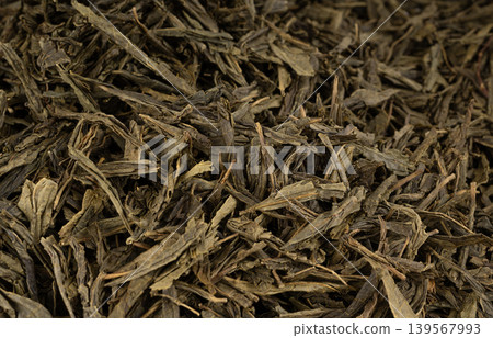 Green tea leaves macro textured background Green tea leaves macro textured background 139567993