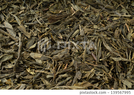Green tea leaves macro textured background Green tea leaves macro textured background 139567995