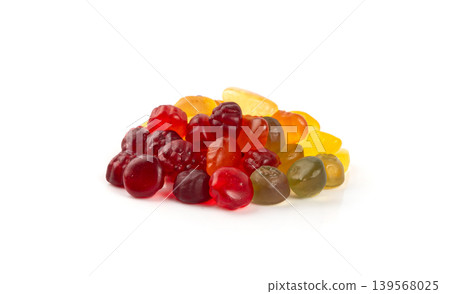 Fruit gummy candy pile isolated, vegan chewing marmalade pills, jelly gumdrops heap Fruit gummy candy pile isolated, vegan chewing marmalade pills, jelly gumdrops heap 139568025