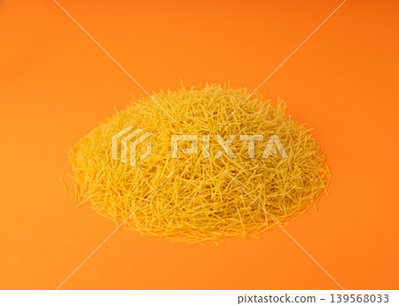 Raw vermicelli, gold soup pasta, small homemade noodles, thin Italy macaroni Raw vermicelli, gold soup pasta, small homemade noodles, thin Italy macaroni 139568033