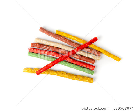 Rawhide chew sticks for dogs, colorful collagen dog food, pressed dry kibble, dental care treats Rawhide chew sticks for dogs, colorful collagen dog food, pressed dry kibble, dental care treats 139568074