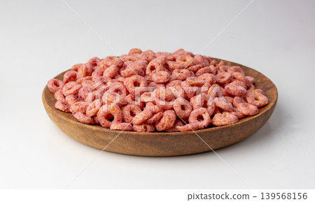 Pink Cereal Rings Isolated, Fruit Breakfast Rice Loops Pink Cereal Rings Isolated, Fruit Breakfast Rice Loops 139568156