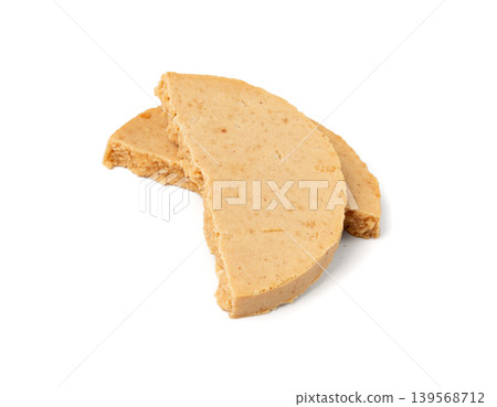 Protein cookie isolated, broken round energy snack with peanuts, chicory fibre Protein cookie isolated, broken round energy snack with peanuts, chicory fibre 139568712