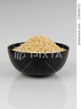 Puffed millet isolated, crispy cereal breakfast, ancient healthy food Puffed millet isolated, crispy cereal breakfast, ancient healthy food 139568722