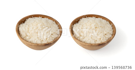 Raw flattened rice isolated. Dry rice flakes or poha, Indian breakfast food Raw flattened rice isolated. Dry rice flakes or poha, Indian breakfast food 139568736