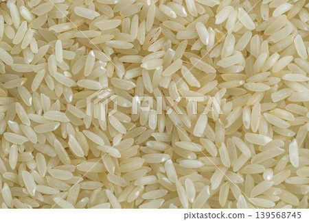 White rice grains texture background White rice grains texture background 139568745
