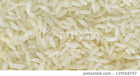 White rice grains texture background White rice grains texture background 139568747