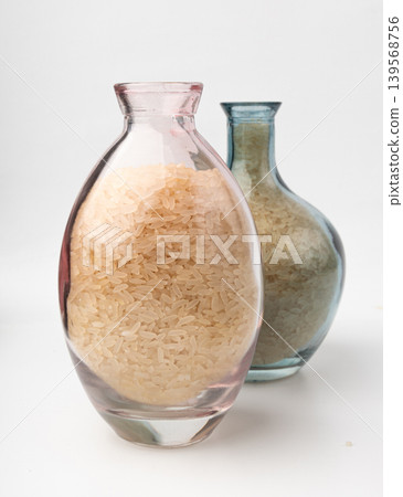 White parboiled rice grains. Dry uncooked ponni rice, small organic basmati White parboiled rice grains. Dry uncooked ponni rice, small organic basmati 139568756