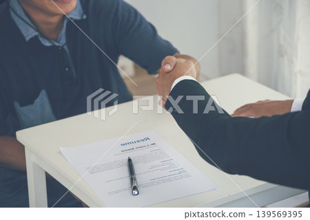 Team Business Partners shaking hands together to Greeting Start up new project. Shakehand Teamwork Partnership at office desk. Businessman partners handshake together. Business concept Team Business Partners shaking hands together to Greeting Start up new project. Shakehand Teamwork Partnership at office desk. Businessman partners handshake together. Business concept 139569395