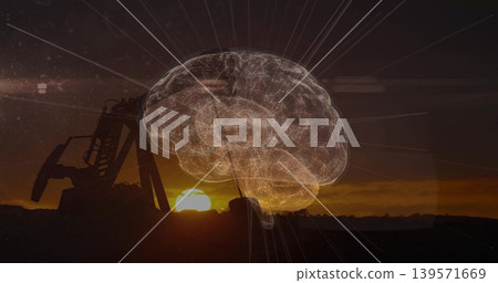 Glowing wireframe brain hologram hovering over plains near horizon aligned with sunset and pumpjack Glowing wireframe brain hologram hovering over plains near horizon aligned with sunset and pumpjack 139571669