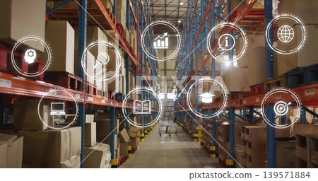 Showing center pallet racking and aisle in warehouse, with boxes, wheeled ladder, digital icons 139571884
