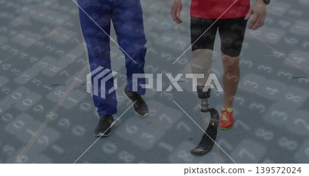 Walking two men moving along blue rubber track, wearing red top, black shorts, prosthetic blade Walking two men moving along blue rubber track, wearing red top, black shorts, prosthetic blade 139572024