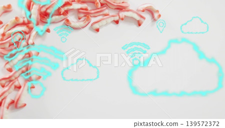 Showing red-pink ribbons left of white studio tabletop, with cyan cloud wifi pin icons, copy space Showing red-pink ribbons left of white studio tabletop, with cyan cloud wifi pin icons, copy space 139572372