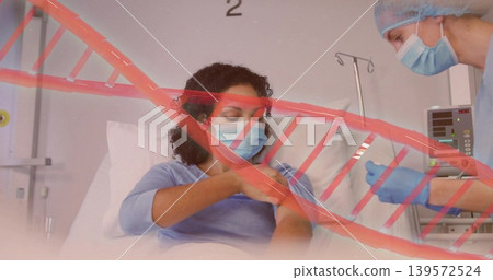 Administering clinician in scrubs mask gloves injecting seated woman in ward, with syringe, red DNA Administering clinician in scrubs mask gloves injecting seated woman in ward, with syringe, red DNA 139572524