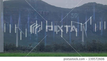 Showing tall wind turbines rising above tree line at rural wind farm, with data overlay Showing tall wind turbines rising above tree line at rural wind farm, with data overlay 139572606