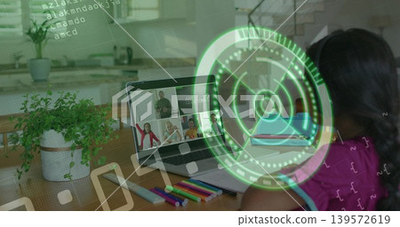 Sitting student pink-top focusing on laptop at home table, markers, plant, stairs, HUD, copy space Sitting student pink-top focusing on laptop at home table, markers, plant, stairs, HUD, copy space 139572619