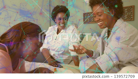 Talking three women in button, white, pink tops sitting at home with phone, papers, network overlay Talking three women in button, white, pink tops sitting at home with phone, papers, network overlay 139572709