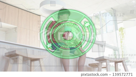 Sitting Asian man wearing red tee and shorts on wooden counter, HUD overlay showing timecode Sitting Asian man wearing red tee and shorts on wooden counter, HUD overlay showing timecode 139572771