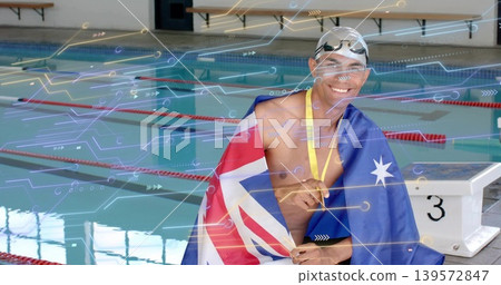 Swimmer sitting at pool beside block 3, wearing cap, gold medal, draping national flag, copy space Swimmer sitting at pool beside block 3, wearing cap, gold medal, draping national flag, copy space 139572847