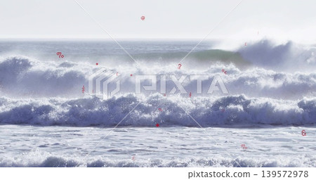Rolling large ocean waves crashing toward shore along coastline, with white foam and spray Rolling large ocean waves crashing toward shore along coastline, with white foam and spray 139572978