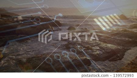 Breaking waves flowing across wet boulders, tide pools at low tide, showing circuit overlay 139572993