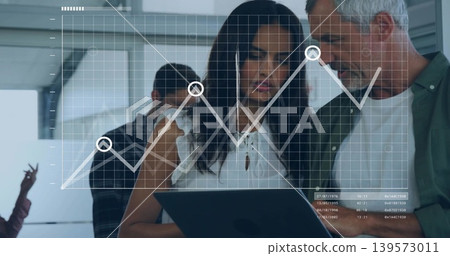 Studying woman in white blouse sharing tablet with team in modern office, line graph overlay 139573011