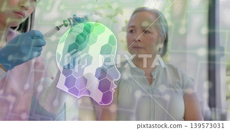 Sitting Asian woman in blouse watching blue-gloved nurse prepping syringe in clinic, head graphic Sitting Asian woman in blouse watching blue-gloved nurse prepping syringe in clinic, head graphic 139573031