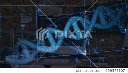 Hovering DNA double-helix hologram showing blue AR grid over desk with monitor, molecular model Hovering DNA double-helix hologram showing blue AR grid over desk with monitor, molecular model 139573107