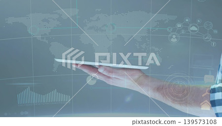 Holding male right hand supporting thin tablet in studio, with holographic map and checkered cuff Holding male right hand supporting thin tablet in studio, with holographic map and checkered cuff 139573108