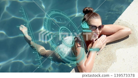 Reclining woman in light swimsuit and sunglasses floating at pool coping, cyan HUD, copy space 139573378