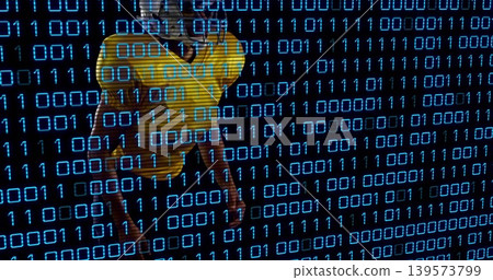 Standing man wearing yellow polo and blue jeans receiving blue binary digits in studio, copy space Standing man wearing yellow polo and blue jeans receiving blue binary digits in studio, copy space 139573799