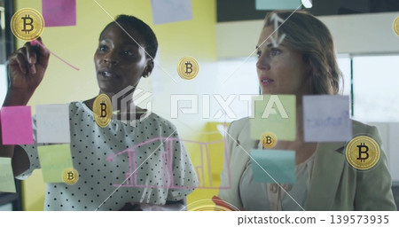 Writing women polka-top blazer drawing on glass board in office with pink-pen notes, Bitcoin icons Writing women polka-top blazer drawing on glass board in office with pink-pen notes, Bitcoin icons 139573935