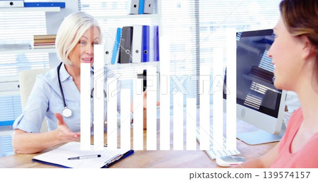Gesturing doctor light-blue-shirt stethoscope, clipboard seeing patient at clinic desk, copy space Gesturing doctor light-blue-shirt stethoscope, clipboard seeing patient at clinic desk, copy space 139574157